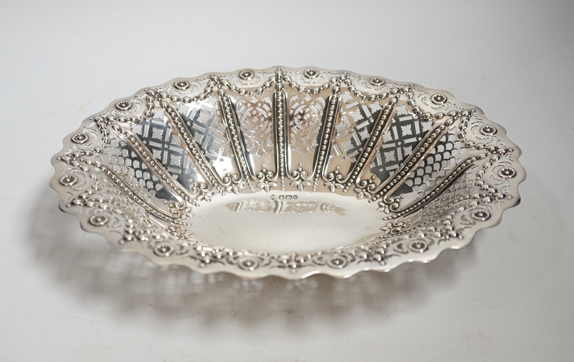 A late Victorian pierced silver oval fruit bowl, Martin, Hall & Co, Sheffield, 1896, 28.1cm, 10.7oz.